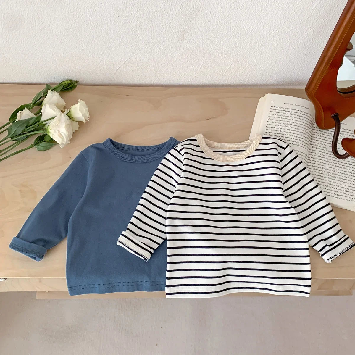 Blue striped cotton short sleeve T-shirt for children, perfect for active summer play.