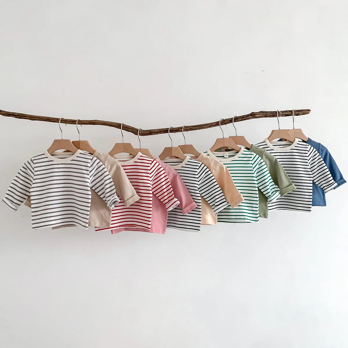 Kids fashion: striped cotton short sleeve T-shirt in red and white for summer wear.