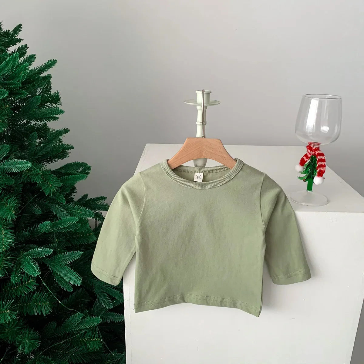 Group of assorted striped and plain cotton short sleeve T-shirts for unisex babies.