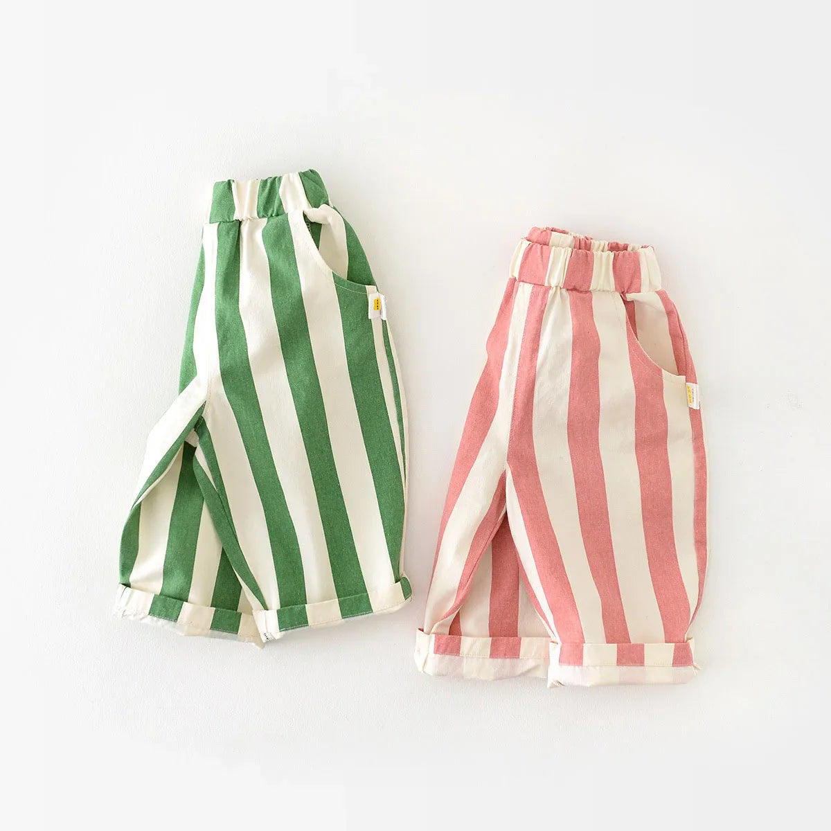 Comfortable unisex baby striped cotton pants with elastic high-waist, ideal for spring autumn wear.
