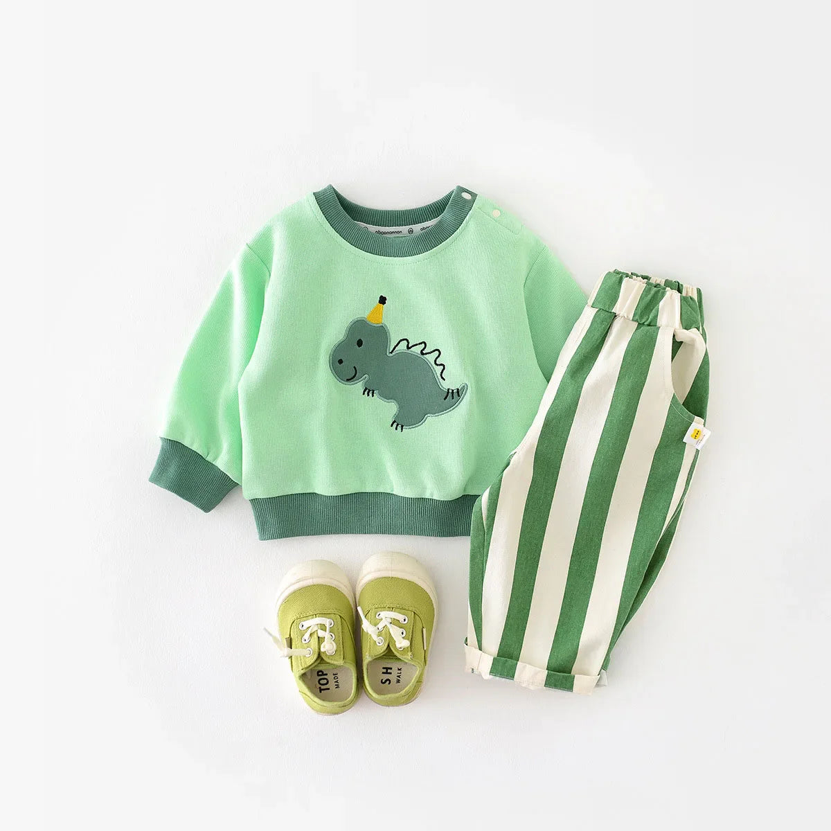 Soft cotton baby pants with high-waist and stripes, designed for comfort and ease of movement for babies.