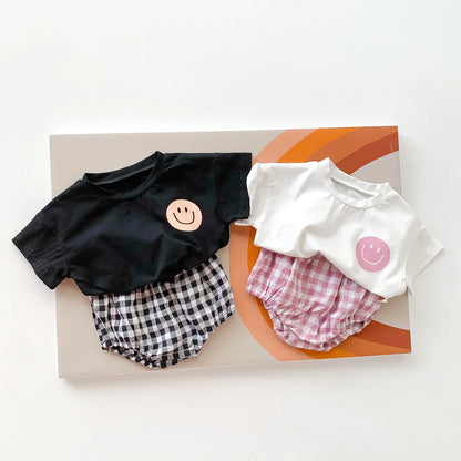 Summer baby set: cheerful smile face t-shirt and adaptable plaid shorts, outdoor play