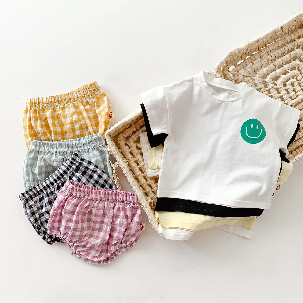 Baby unisex smile face graphic t-shirt and comfortable woven plaid shorts set