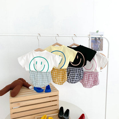 Cute smiley face t-shirt and red plaid shorts, a stylish baby unisex summer set