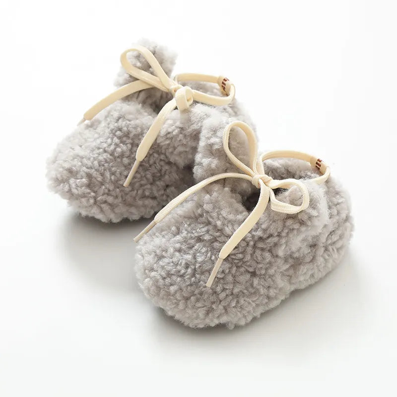 Crib shoes, unisex, soft sole, anti-slip, designed for warm winter wear and safety.