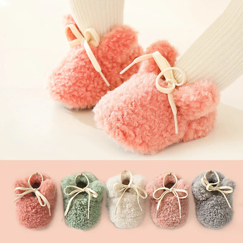 Warm crib shoes for baby boy, soft sole, anti-slip for secure first steps in winter.