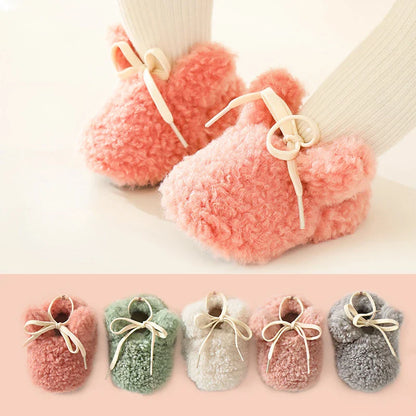 Warm crib shoes for baby boy, soft sole, anti-slip for secure first steps in winter.