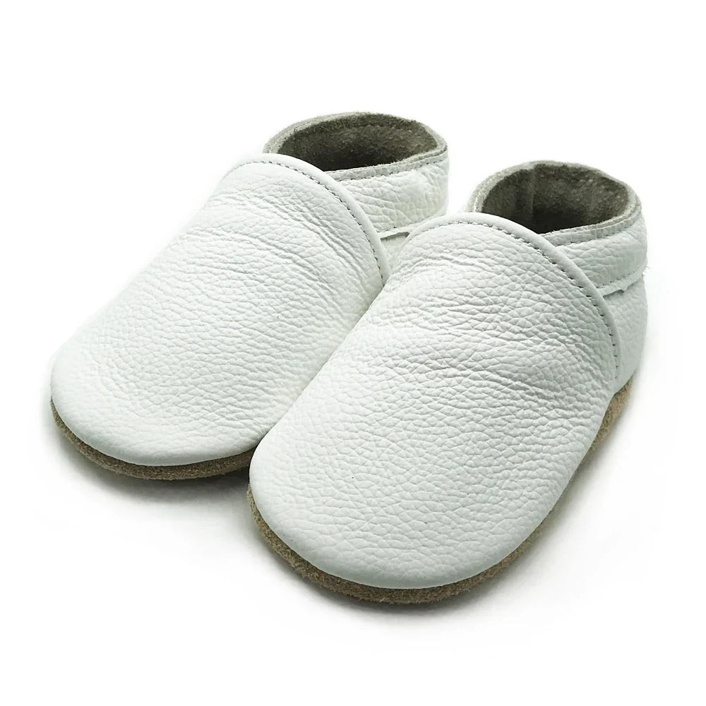 Baby's happy feet in soft brown leather booties, perfect newborn & infant walking shoes