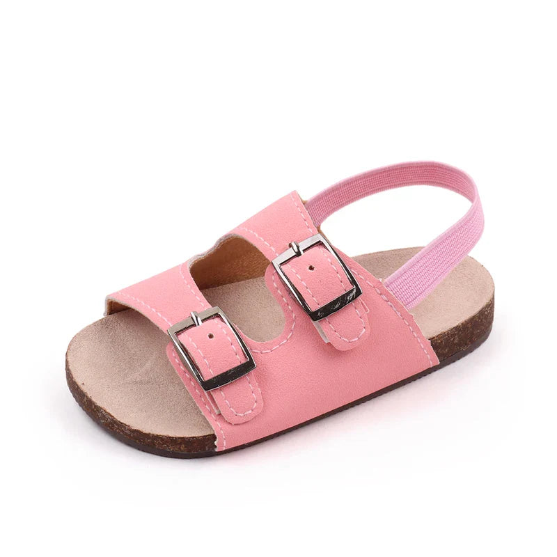 Durable PU leather baby sandals with soft sole and dual buckles, great for summer play and first steps.