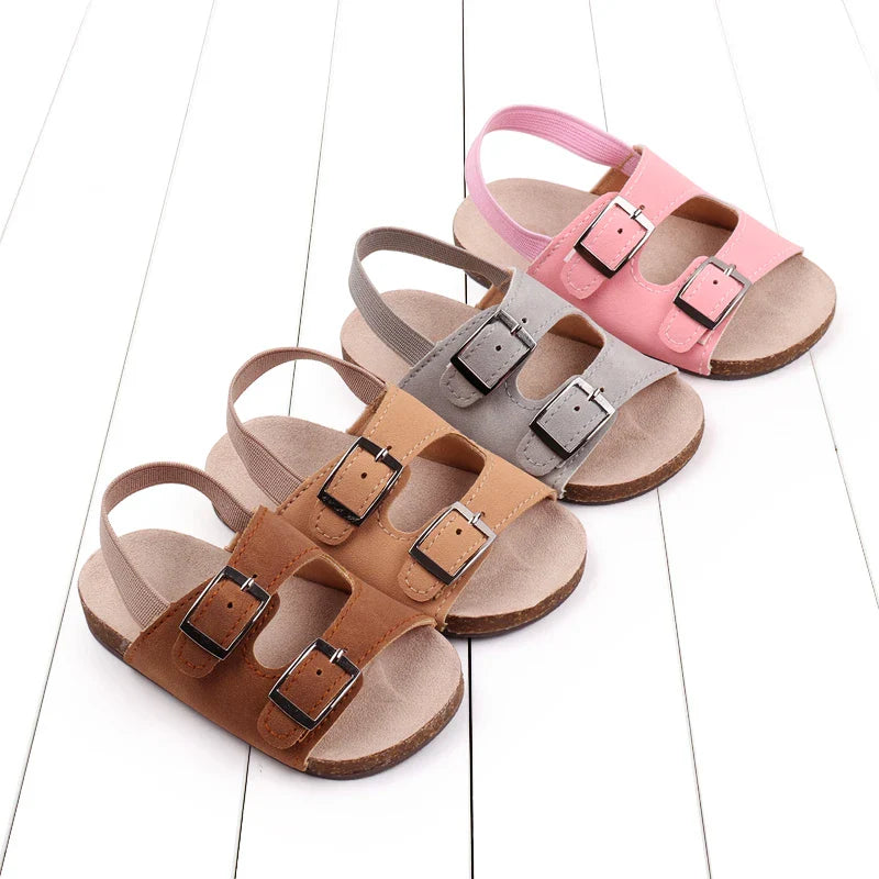 Comfy baby sandals with soft sole and dual buckles, perfect for summer, newborn and infant first walker shoes.