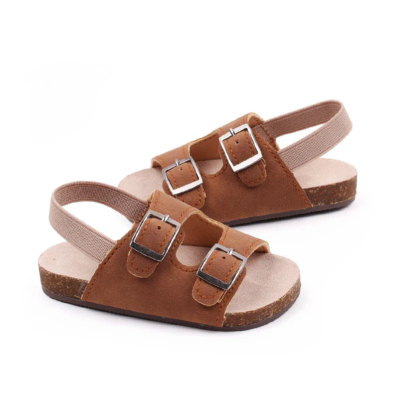 First walker baby sandals featuring a soft sole and dual buckle design for ultimate infant comfort.