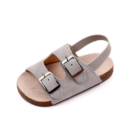 Comfortable unisex baby sandals, soft sole, dual buckle closure, essential summer infant footwear.