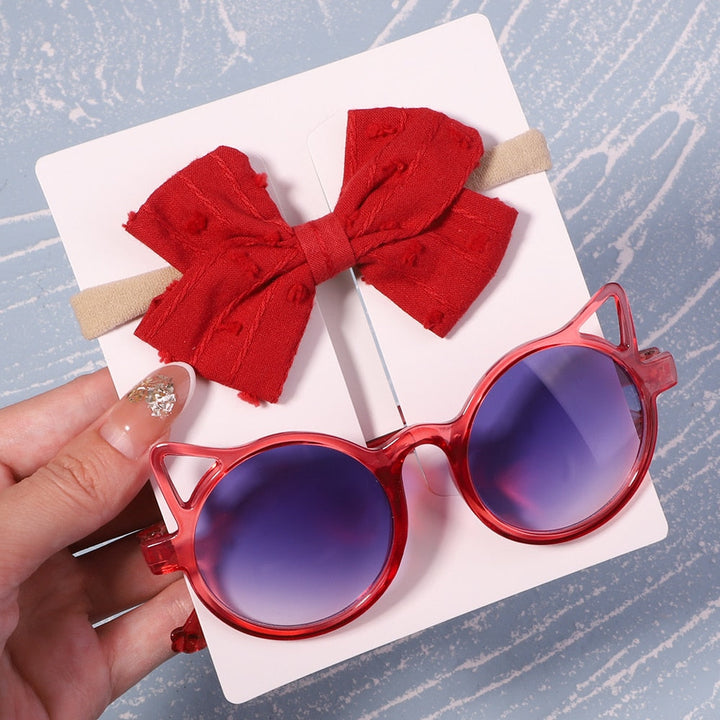 All-season baby UV sunglasses & bow set. Protection & style for year-round sunny days.