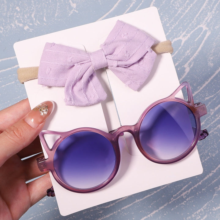 Modern baby UV protective eyewear & matching bow. A must-have for infant outdoor activities.