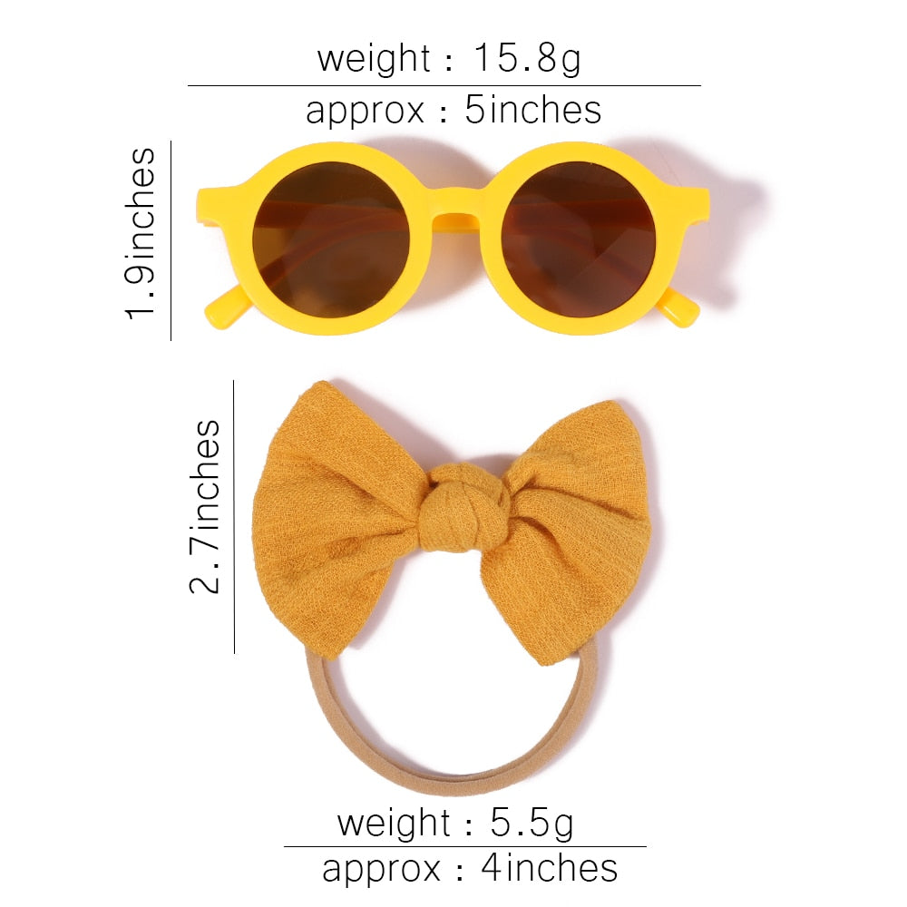 Charming baby UV protective sunglasses & bow. Ensures vision health & adds adorable flair.