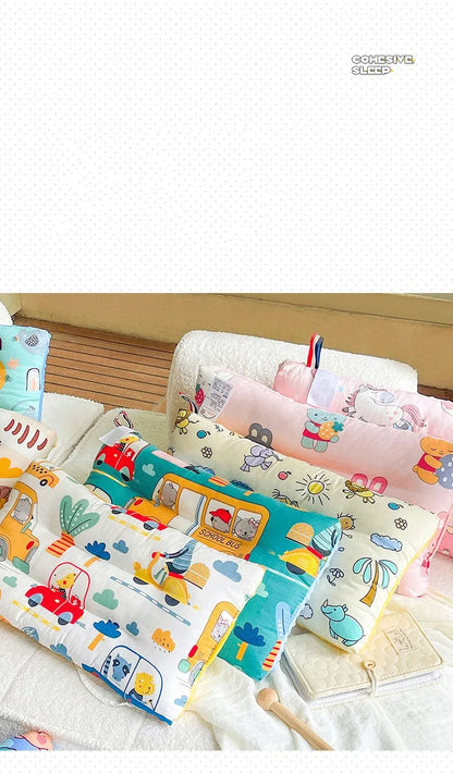 Infant sleep solution: a comfortable velvet pillow with a playful cartoon animal print.