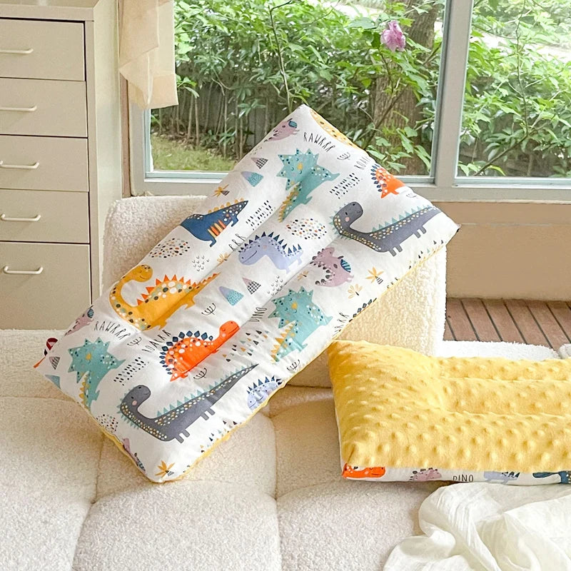 Toddler velvet pillow, ergonomically shaped for head and neck support, ensuring baby comfort.