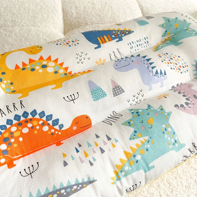 Velvet baby sleep aid pillow with gentle contours, promoting healthy and comfortable sleep for infants.