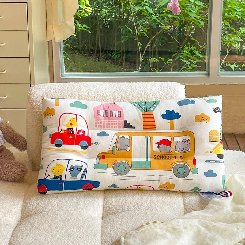 Ergonomic velvet baby pillow, designed to prevent flat head syndrome in infants and toddlers.