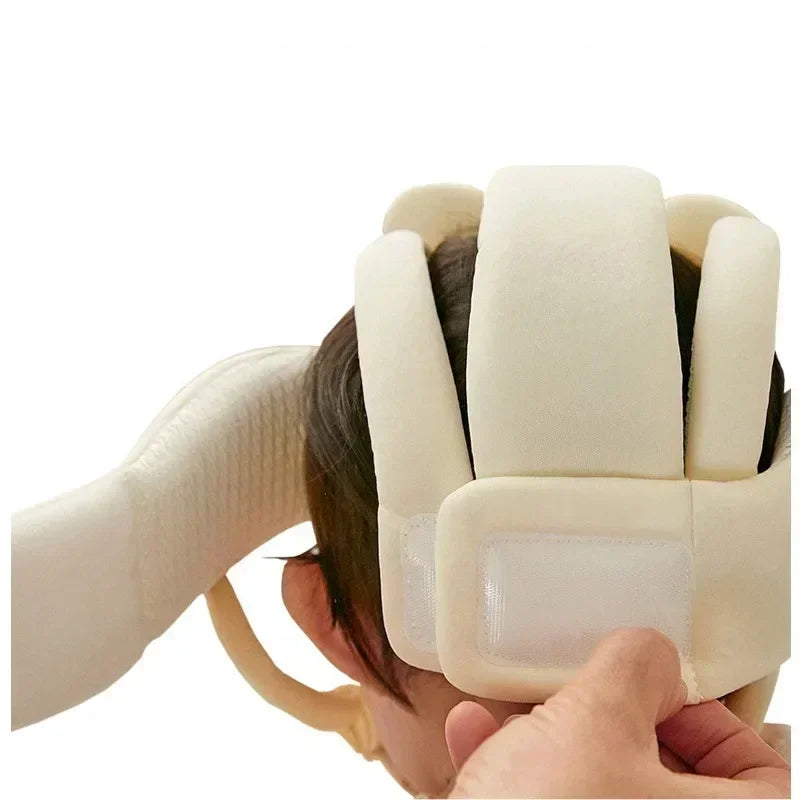 Side view of a baby head protector helmet with adjustable strap for a secure fit