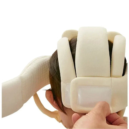 Side view of a baby head protector helmet with adjustable strap for a secure fit