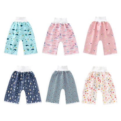Baby wearing white reusable waterproof diaper pants, perfect for potty training.