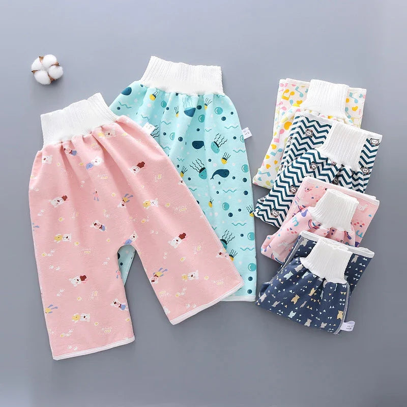 Front view of a pink reusable waterproof diaper pant, ideal for baby girls.