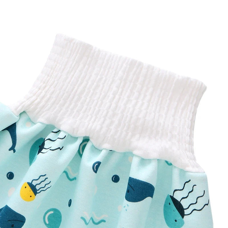 Back view of a green reusable waterproof baby diaper pant, leak-proof design.