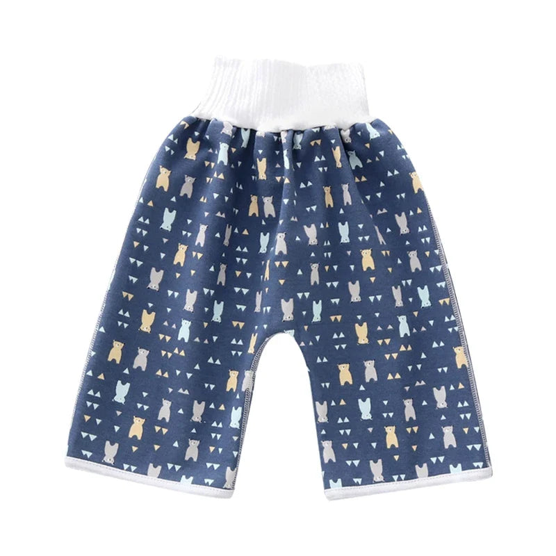 Stack of colorful reusable waterproof diaper pants for babies, toddler wear essentials.