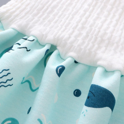 Mother changing baby into a comfortable reusable waterproof cotton diaper pant.