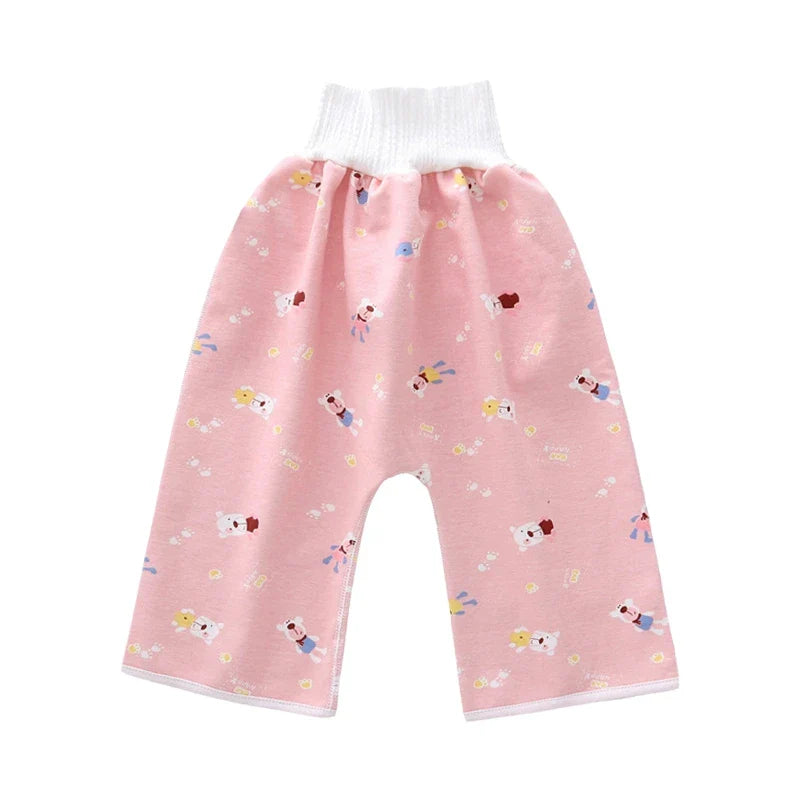 Toddler playing happily in soft, breathable reusable waterproof diaper pants.