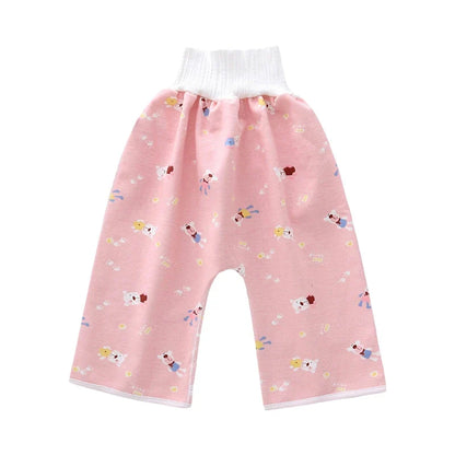 Toddler playing happily in soft, breathable reusable waterproof diaper pants.