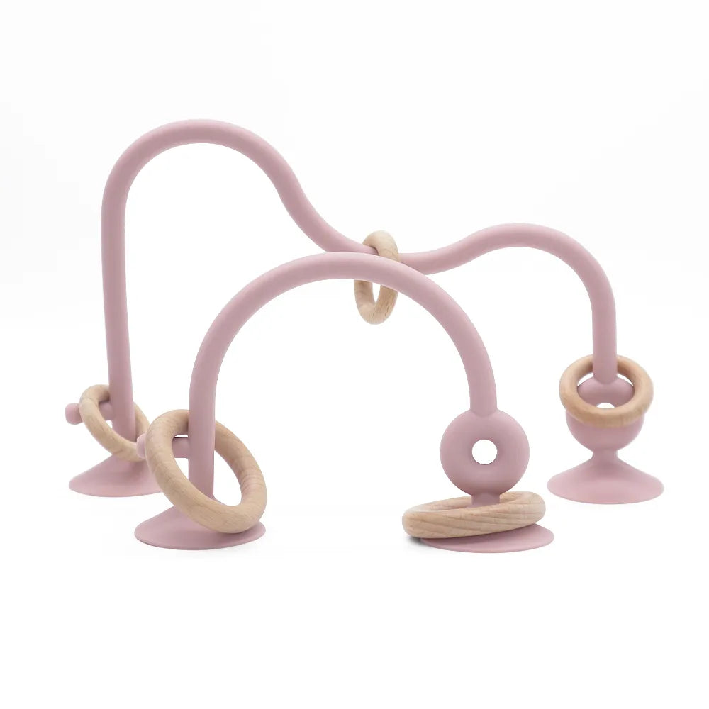 Eco-friendly baby teether: organic wood ring & grey silicone, perfect for soothing sensitive gums