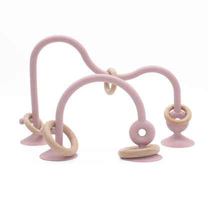 Eco-friendly baby teether: organic wood ring & grey silicone, perfect for soothing sensitive gums