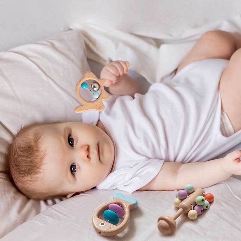 Baby wooden sensory rattle and teether toy set with multiple pieces