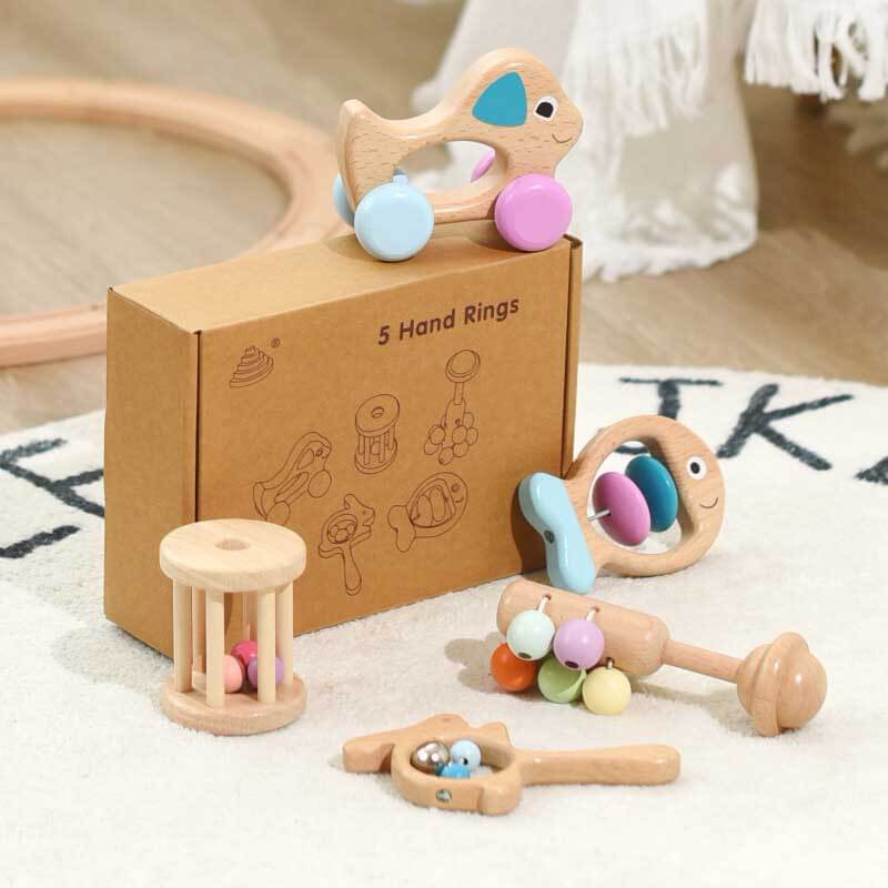 Assortment of wooden baby rattles and teethers for sensory play