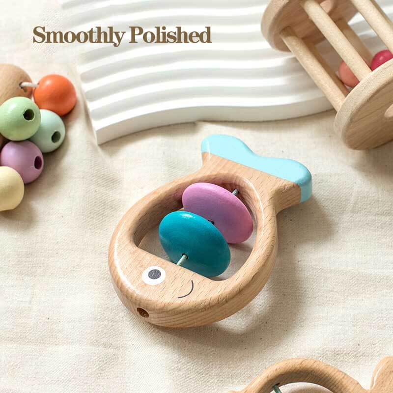 Newborn gift set featuring wooden rattles and teethers for fine motor skills