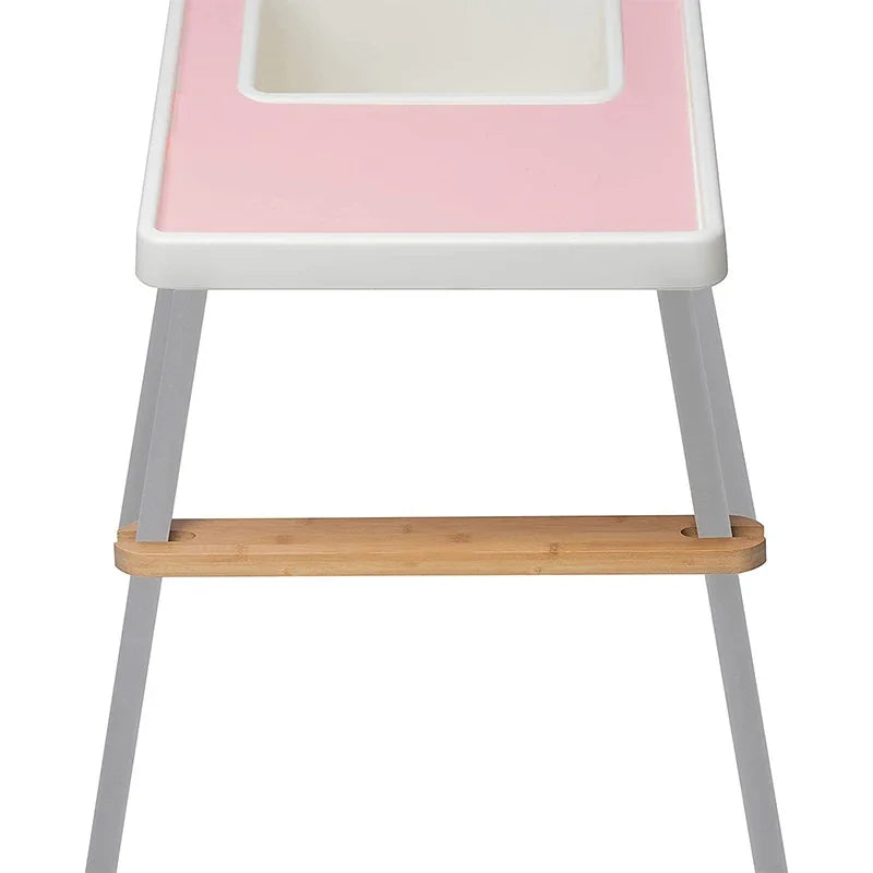 Eco-friendly bamboo high chair footrest accessory, perfect for toddler mealtime and proper seating.