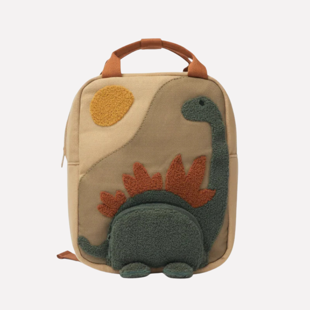 Beige children's dinosaur backpack, perfect for school. Durable kids school bag for boys and girls, fun dino design.