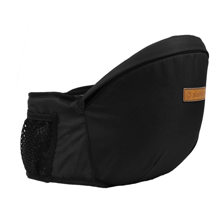 Detailed image of the padded waist belt on a beige ergonomic baby carrier, promoting parent comfort