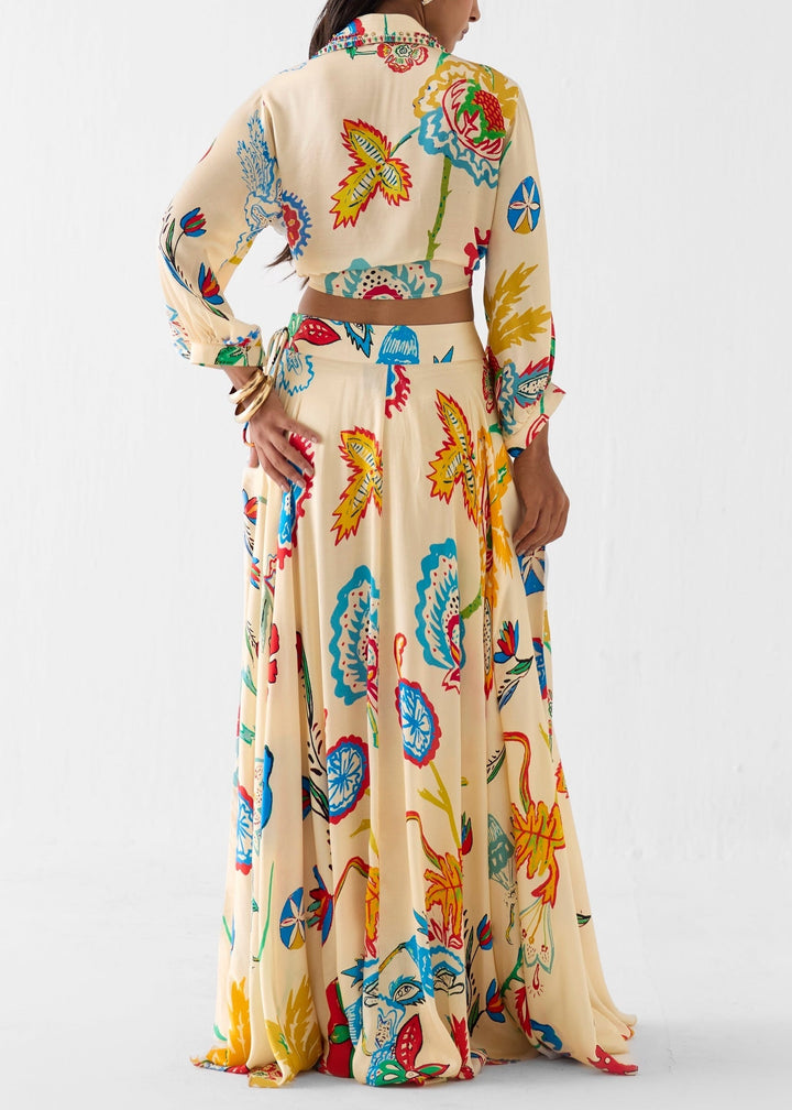 Women's beige floral print matching set, a stylish tie-front crop top & high-waisted maxi skirt for vacation fashion.