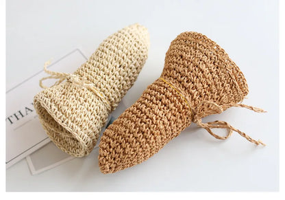 Kids' foldable straw sun hat, available in beige/brown, perfect for beach & sun protection.