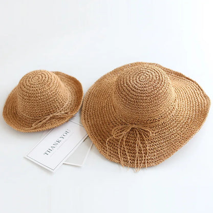 Children's sun hat: stylish brown straw, perfect for summer adventures & beach.