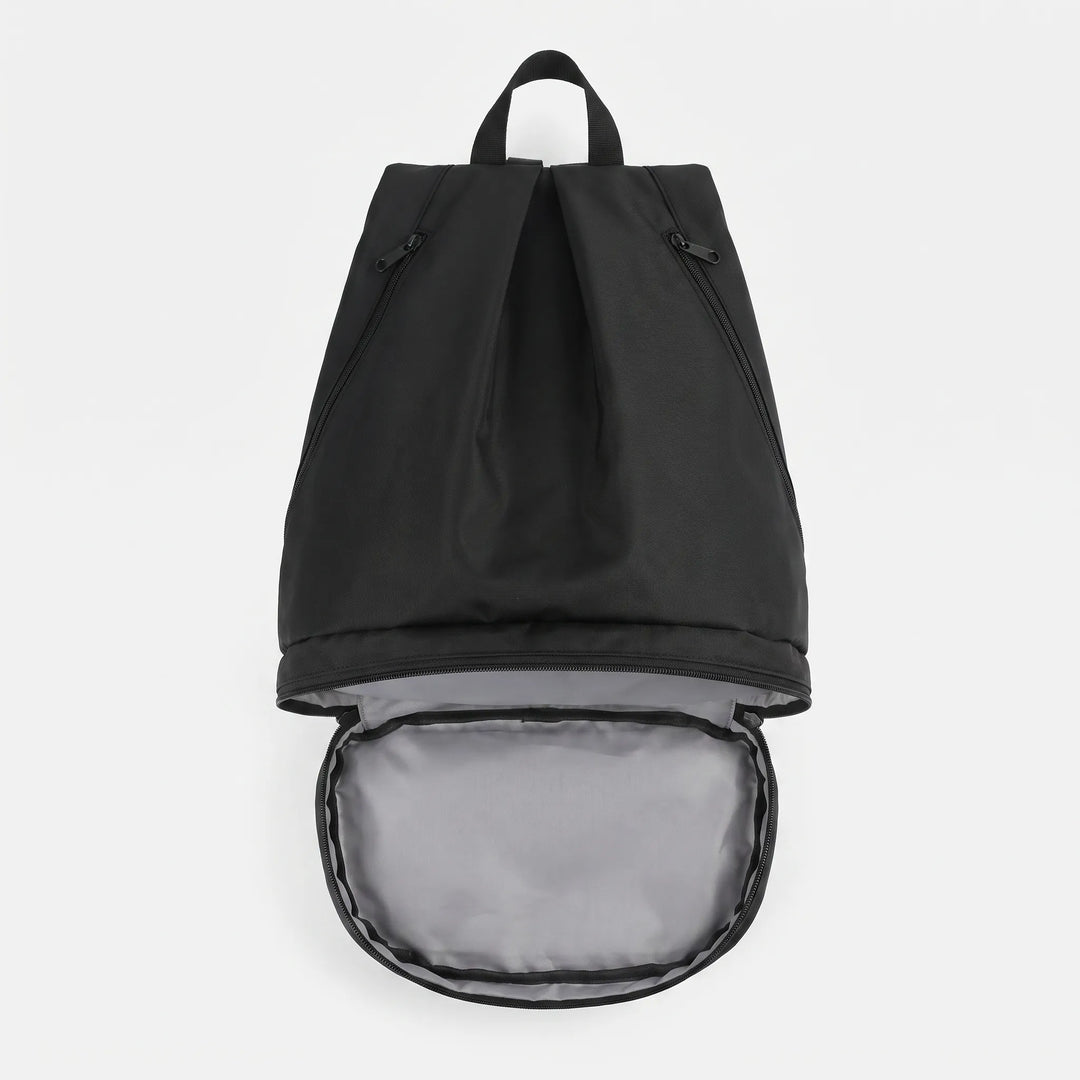 Hiker wearing beige water-repellent adventure backpack, unisex travel pack for outdoor exploration.
