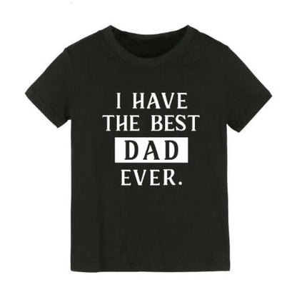 Close-up of 'Best Dad' graphic print on a white toddler t-shirt, unisex casualwear baby clothing