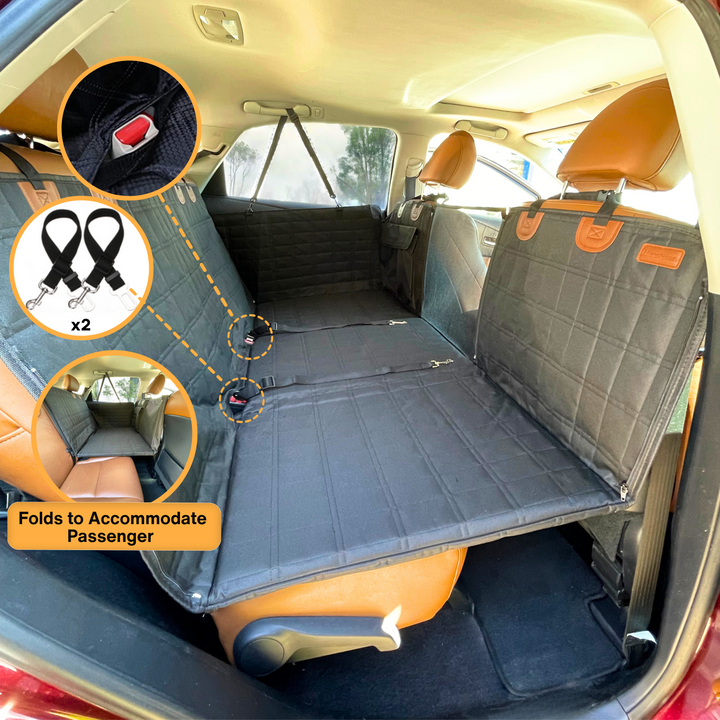 Waterproof black backseat extender for dogs, ensuring pet safety & clean car interior during travel.