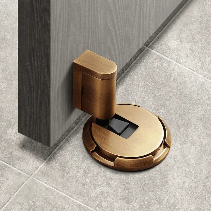 Black magnetic door stopper for home & office. Self-adhesive, no drilling needed. Protects walls & holds doors.