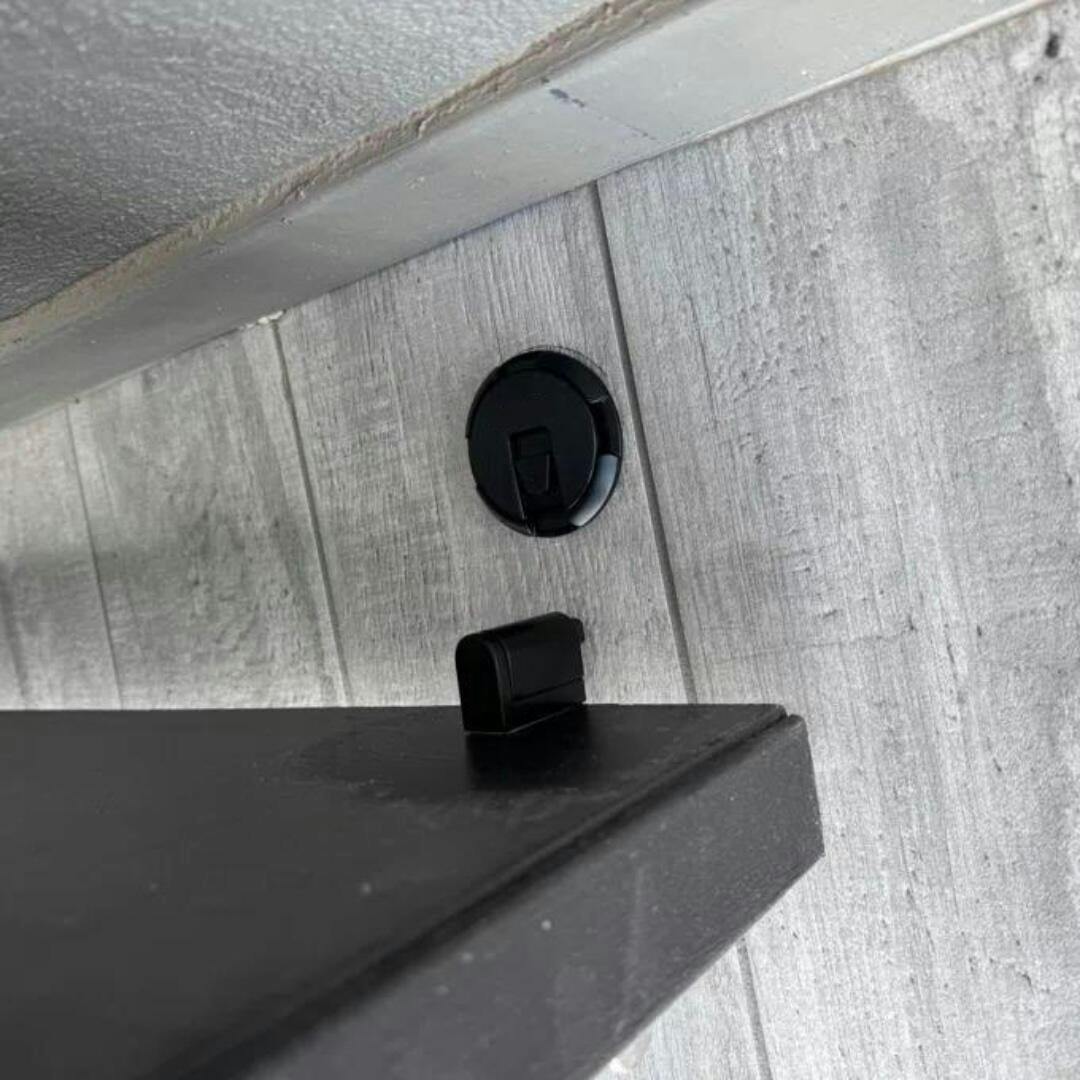 DIY magnetic door stop, no drilling needed. Self-adhesive black door holder for quick home & office setup.