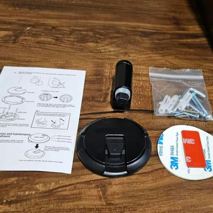 Sleek black magnetic door stopper. Self-adhesive, no drilling. Ideal for modern home interior door protection.