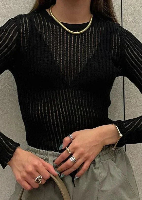 Fitted women's sheer textured long sleeve top, elegant and trendy, perfect for versatile styling.